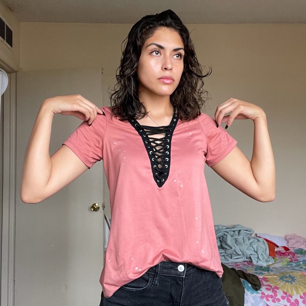 Pink silky T-shirt with black and silver details